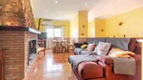 Sala d'estar de Casa adosada en venda en Motril amb Aire condicionat i Terrassa