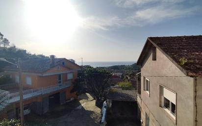 Vista exterior de Casa o xalet en venda en Oia amb Calefacció, Jardí privat i Balcó