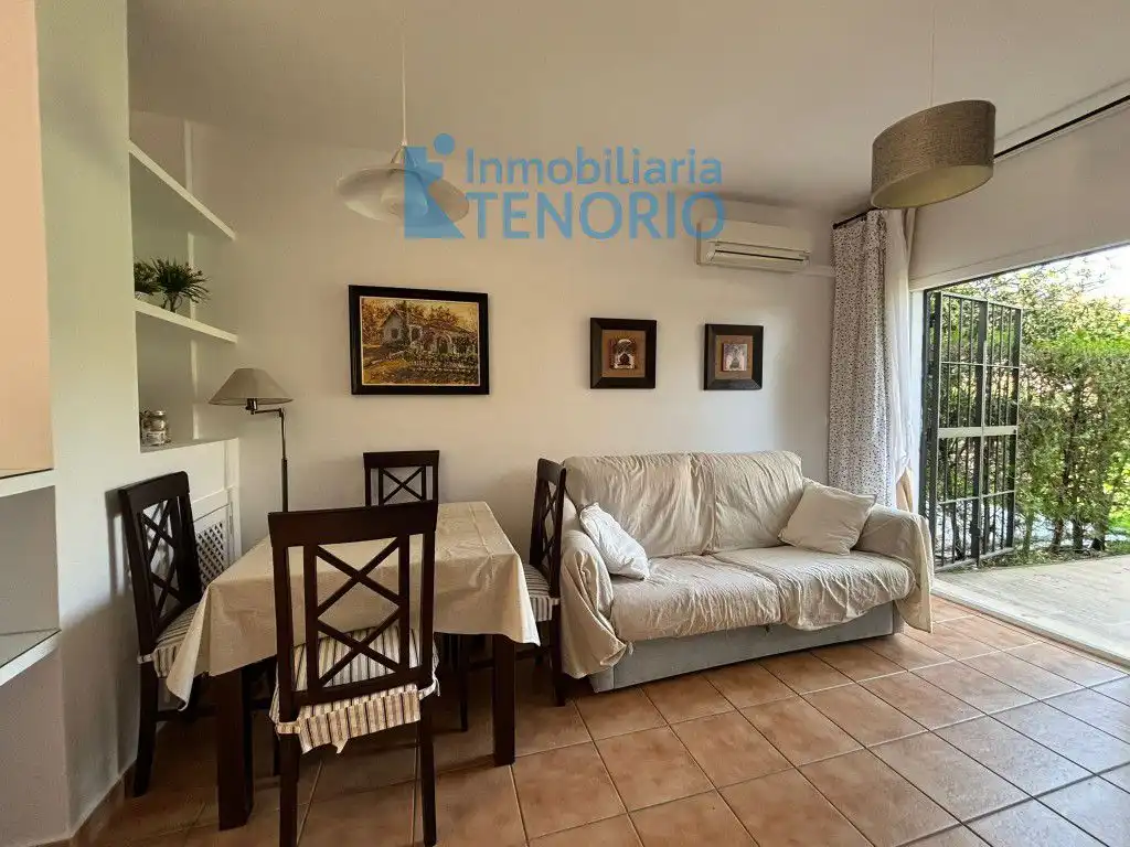 Sala de estar de Casa adosada en venta en Islantilla con Aire acondicionado, Terraza y Trastero