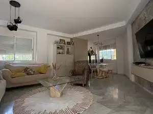 Sala d'estar de Casa o xalet en venda en Gines amb Jardí privat i Moblat