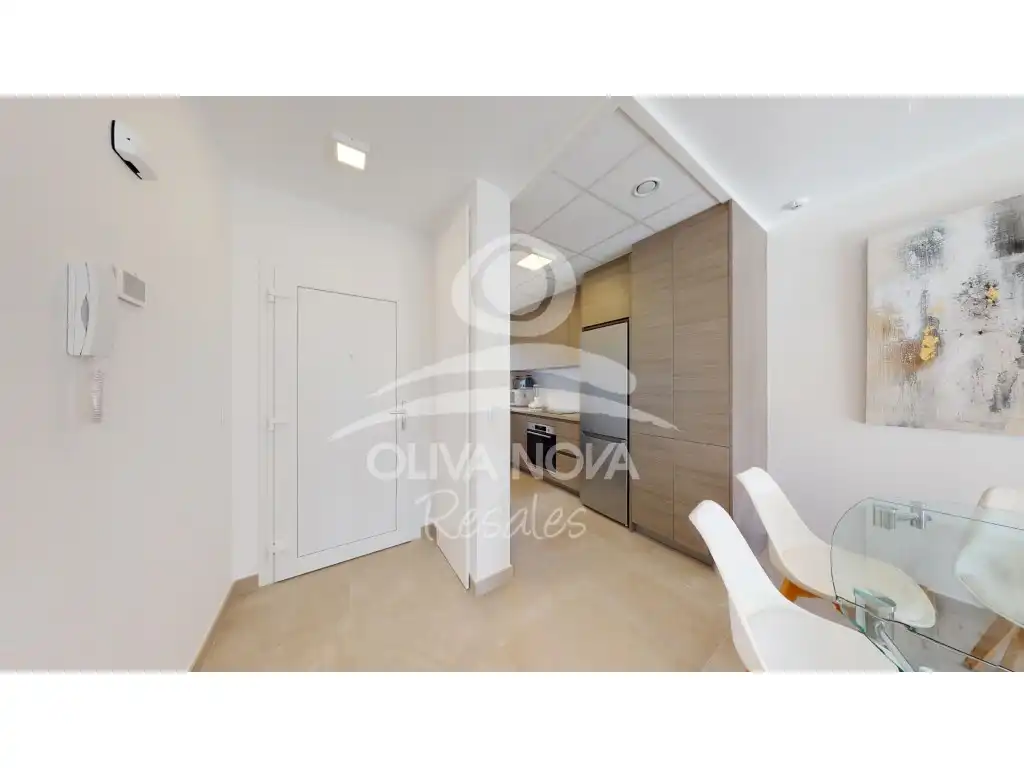 Cuina de Apartament en venda en Oliva amb Aire condicionat, Jardí privat i Piscina