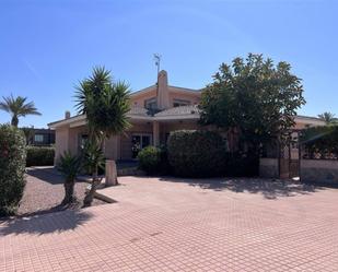 Vista exterior de Casa o xalet en venda en La Manga del Mar Menor amb Aire condicionat, Calefacció i Jardí privat