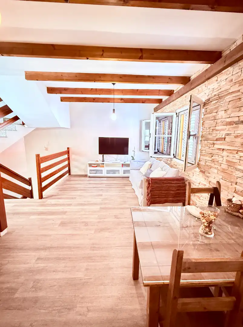 Sala d'estar de Casa adosada en venda en Agüimes - Temisas