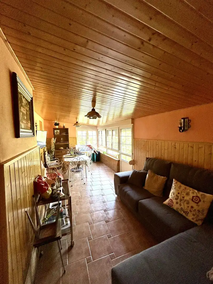Sala de estar de Casa o chalet en venta en Villadangos del Páramo con Calefacción, Terraza y Piscina