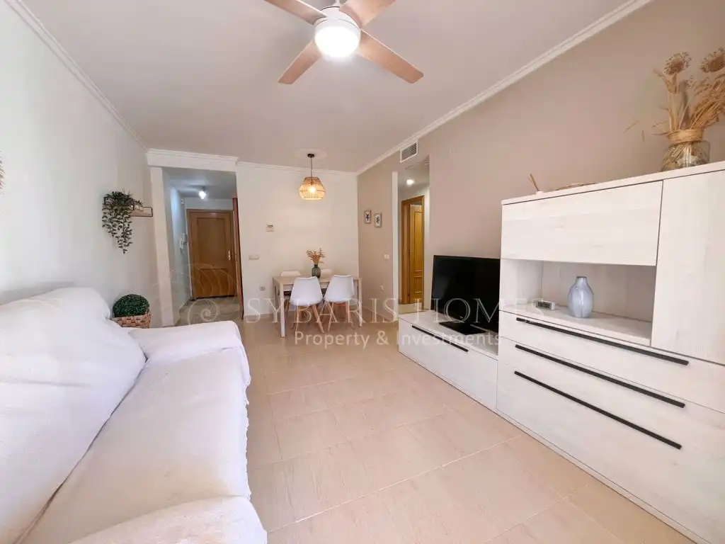 Sala de estar de Apartamento de alquiler en Dénia con Aire acondicionado, Jardín privado y Terraza