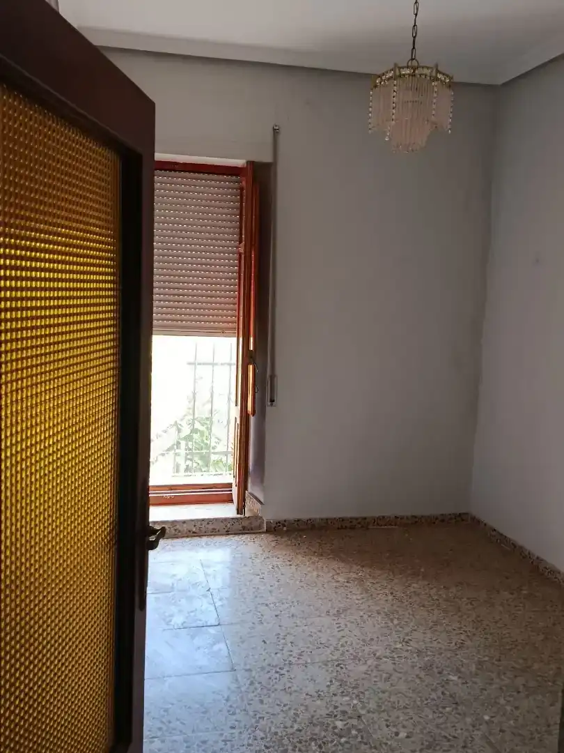 Casa adosada en venda en Linares amb Balcó