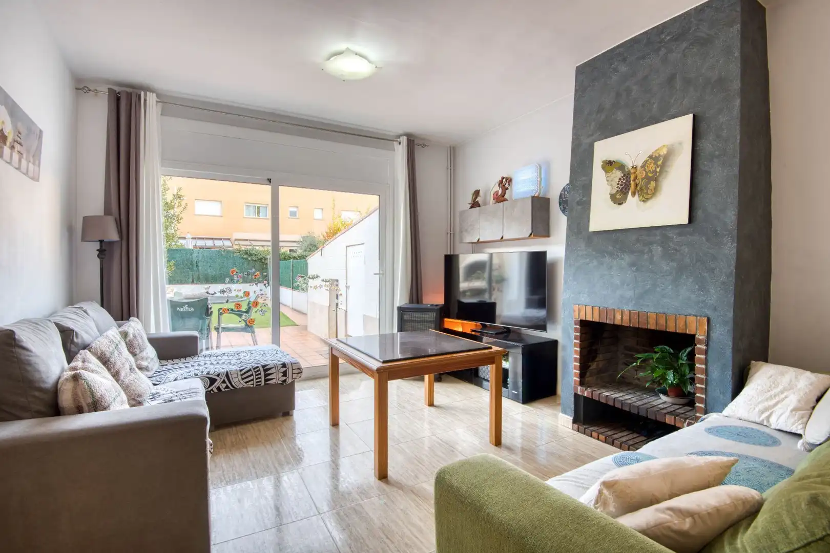 Sala de estar de Casa adosada en venta en Santa Cristina d'Aro con Calefacción, Jardín privado y Terraza