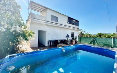 Swimming pool of House or chalet for sale in Oliva  with Air Conditioner and Terrace