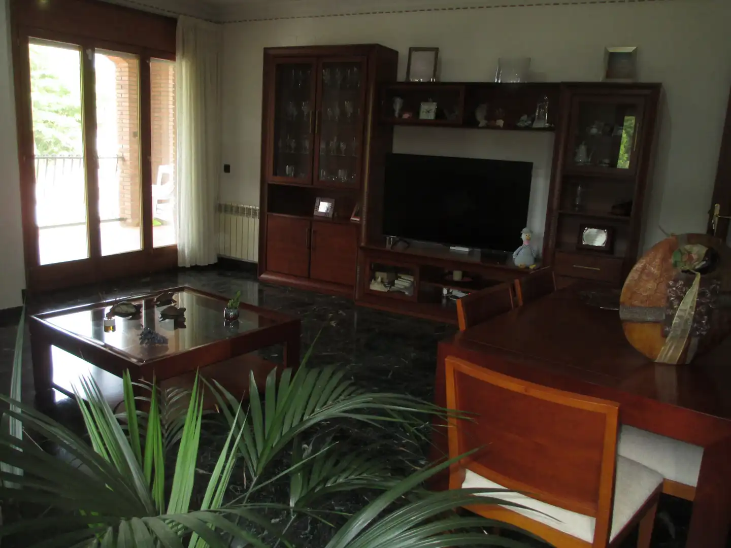 Sala d'estar de Casa adosada en venda en Sant Celoni amb Calefacció, Terrassa i Traster
