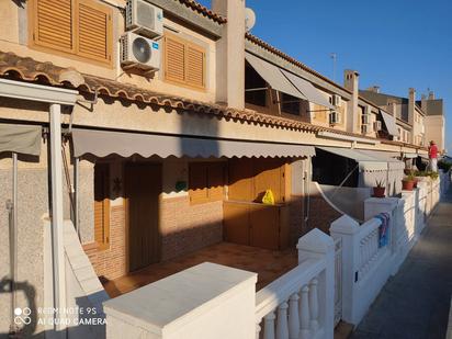 Vista exterior de Casa adosada en venda en Santa Pola amb Aire condicionat, Terrassa i Moblat