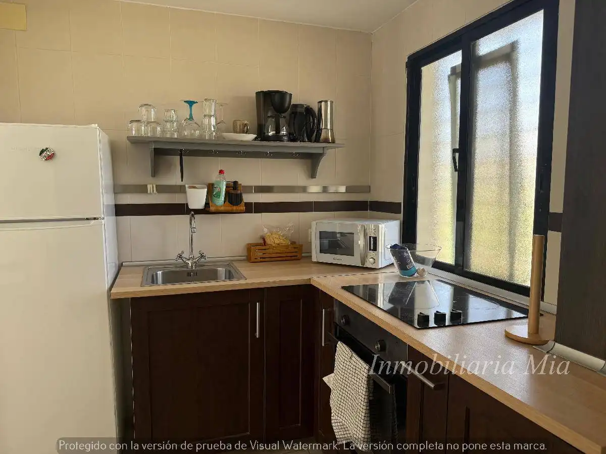 Cuina de Apartament en venda en Torremolinos amb Aire condicionat, Jardí privat i Terrassa