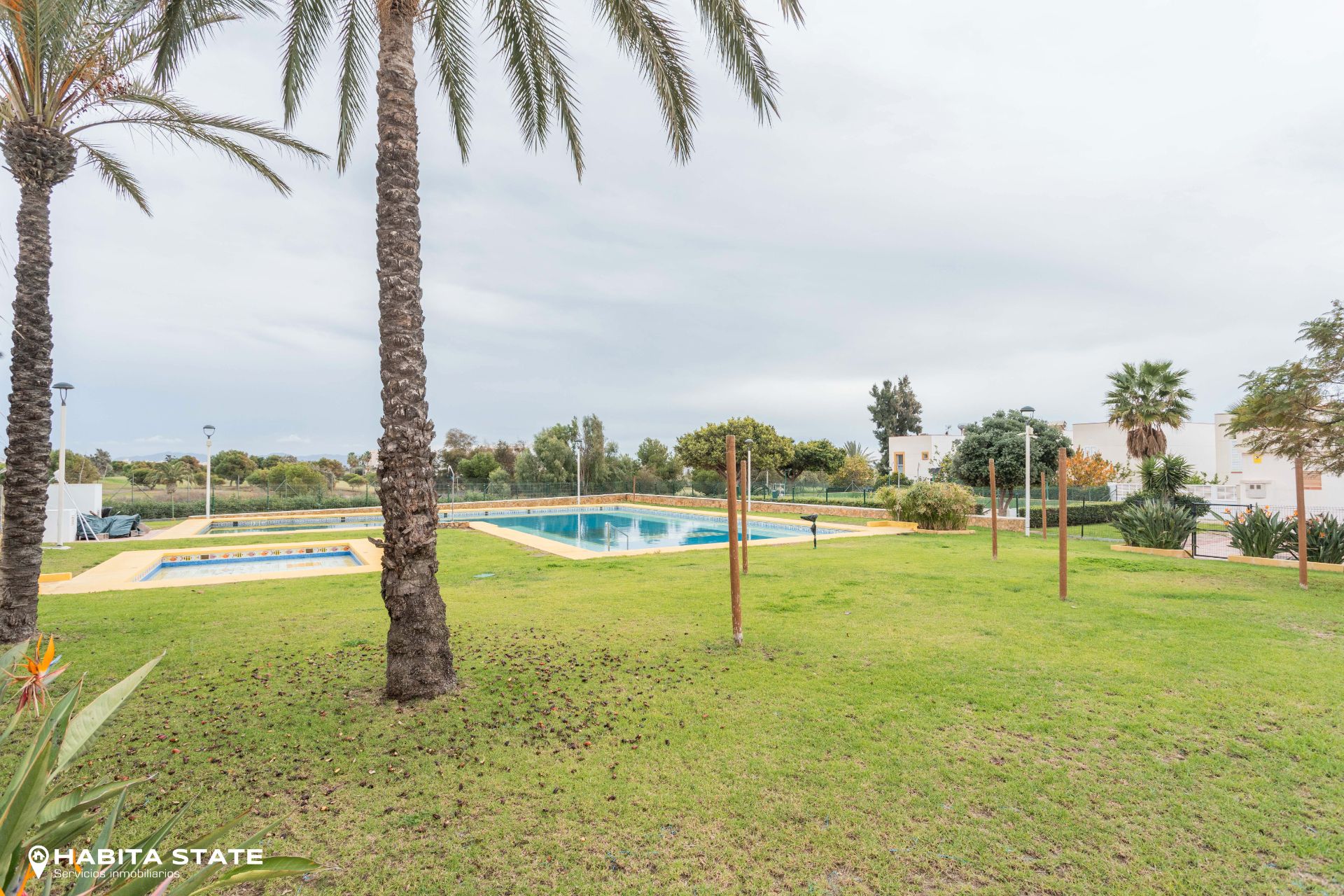 Swimming pool of Flat for sale in  Almería Capital  with Air Conditioner and Community pool