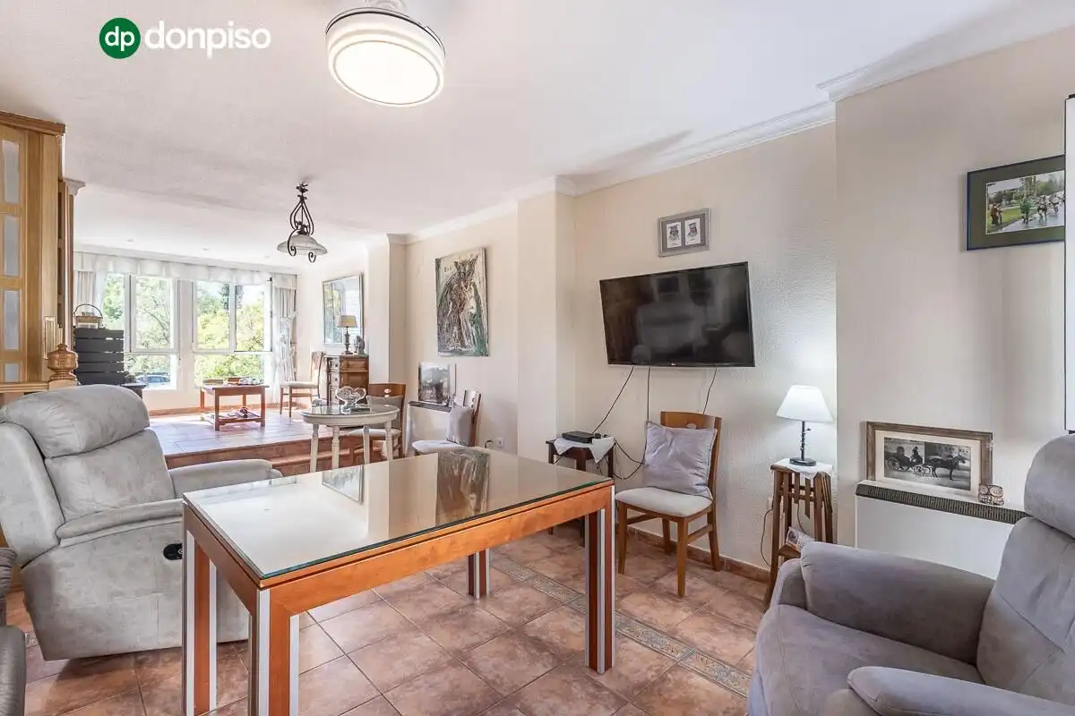 Sala de estar de Casa adosada en venta en Genil