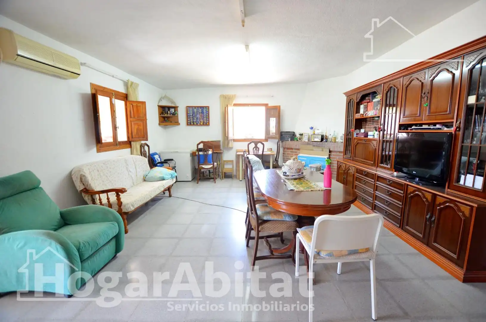 Sala d'estar de Casa o xalet en venda en Alicante / Alacant amb Aire condicionat, Calefacció i Jardí privat