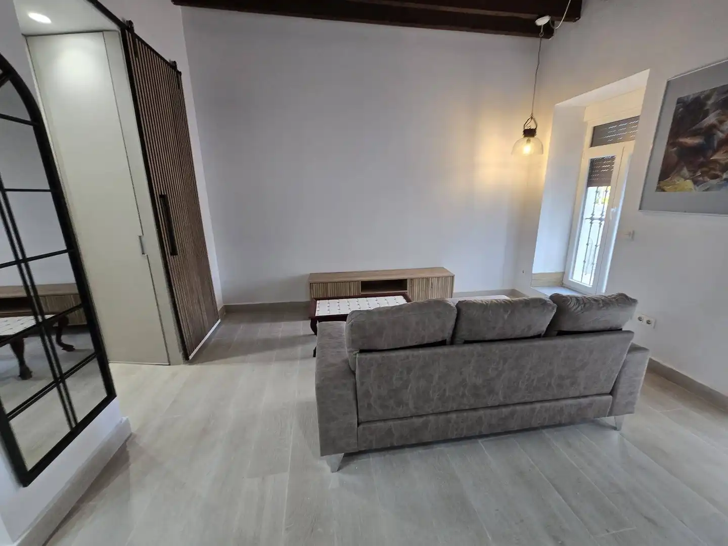 Wohnzimmer von Erdgeschoss zur Miete in Centro