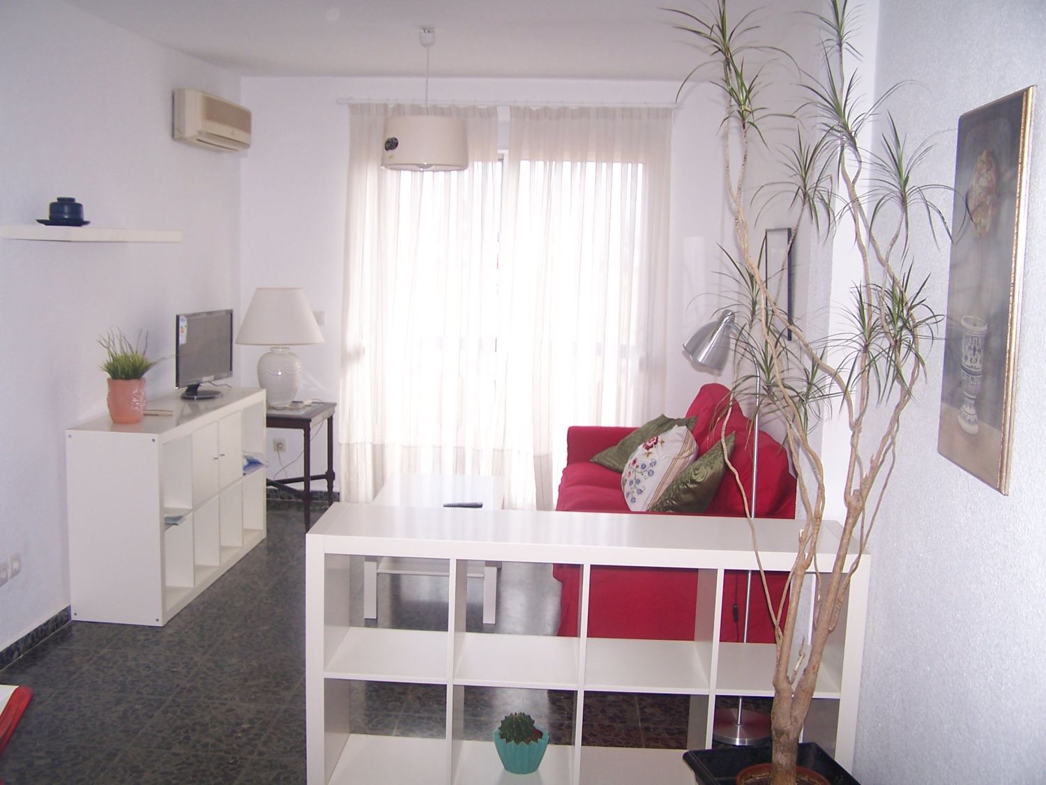 Sala d'estar de Pis de lloguer en  Huelva Capital amb Aire condicionat, Moblat i Balcó