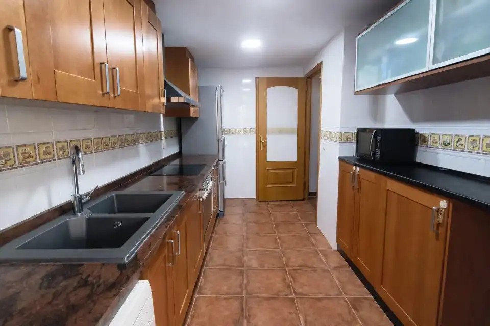 Cuina de Casa adosada en venda en Sagunto / Sagunt amb Aire condicionat, Calefacció i Terrassa
