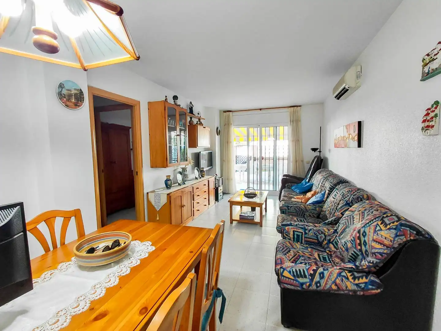 Living room of Ground floor for sale in Cunit  with Air Conditioner, Private garden and Terrace