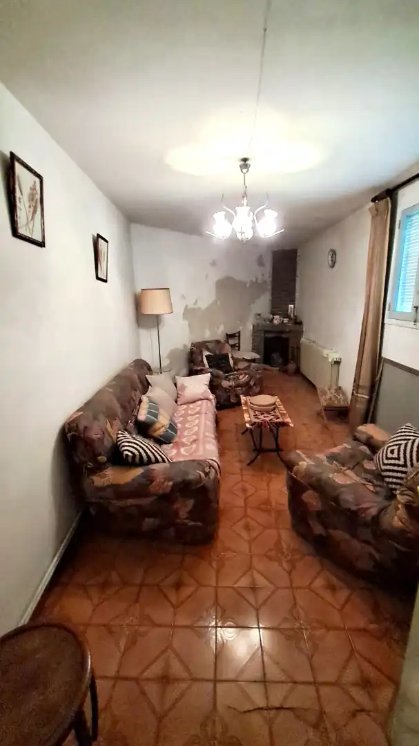 Sala de estar de Casa o chalet en venta en Cuéllar con Calefacción, Terraza y Amueblado