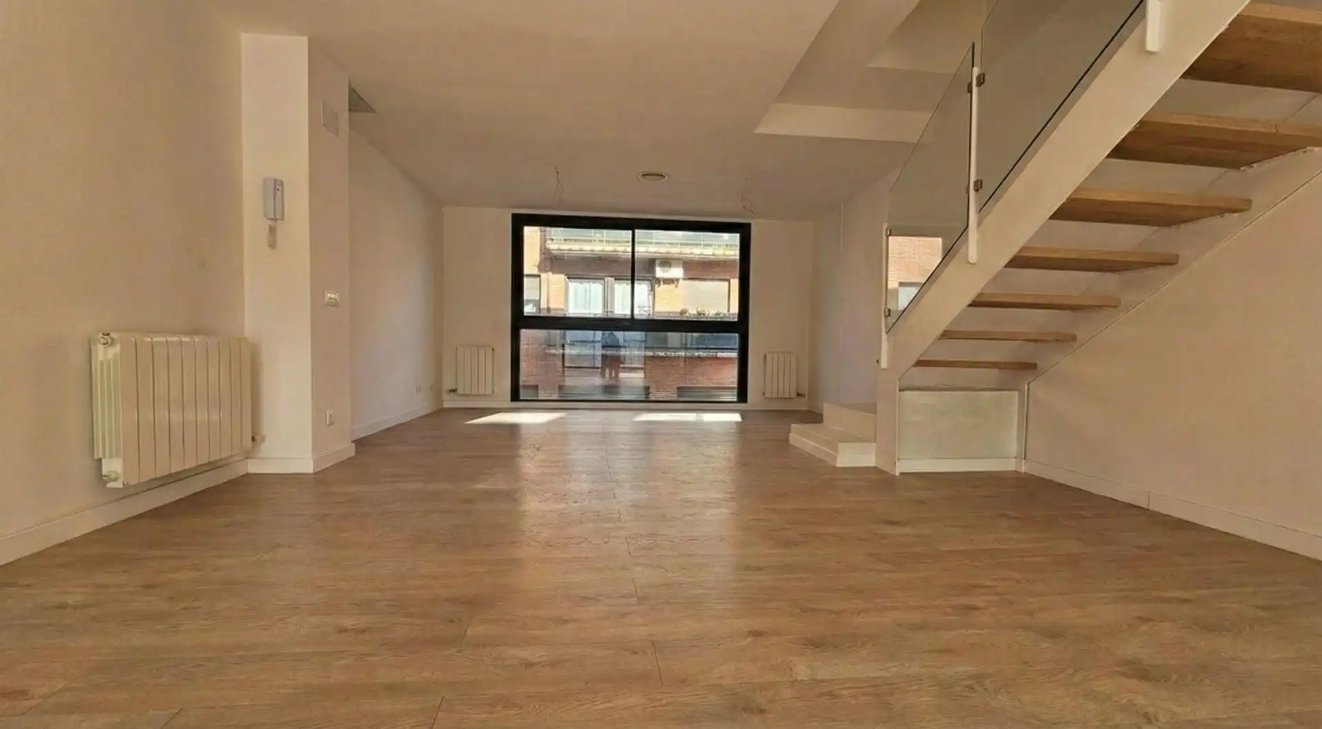 Sala de estar de Casa adosada en venta en Hostalric con Aire acondicionado, Calefacción y Jardín privado