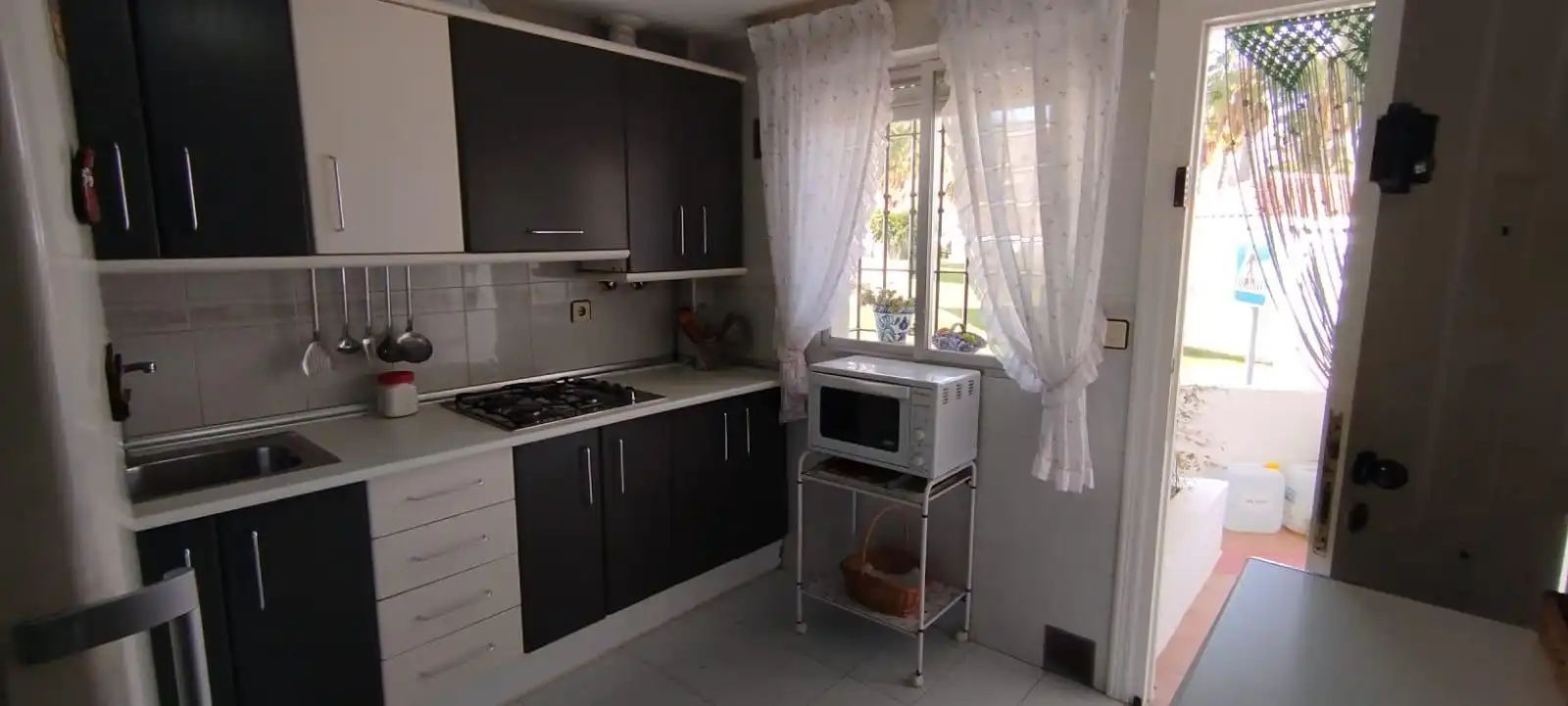 Cocina de Casa adosada en venta en Motril con Aire acondicionado, Terraza y Trastero
