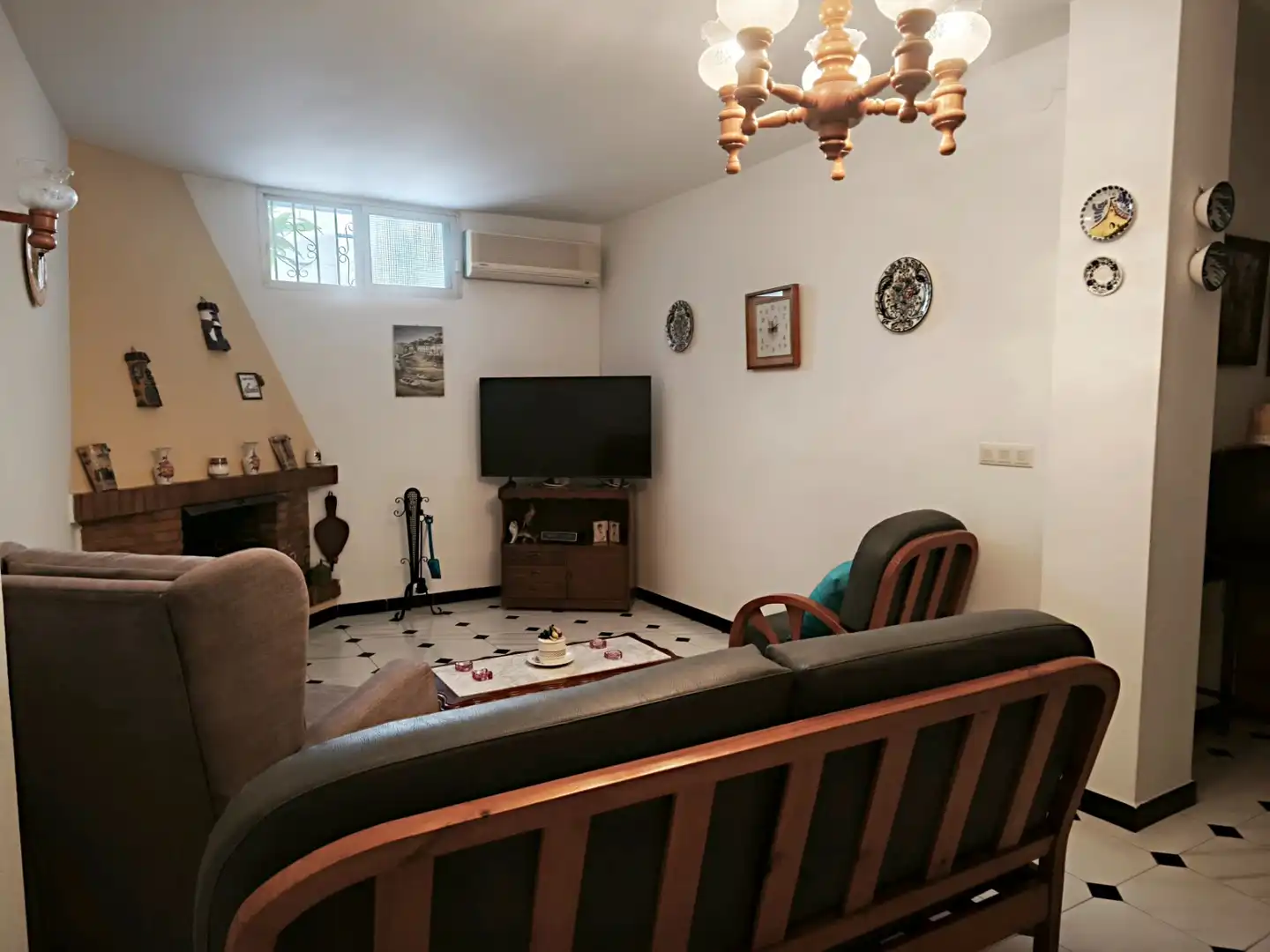 Sala de estar de Casa adosada en venta en Málaga con Aire acondicionado, Terraza y Amueblado