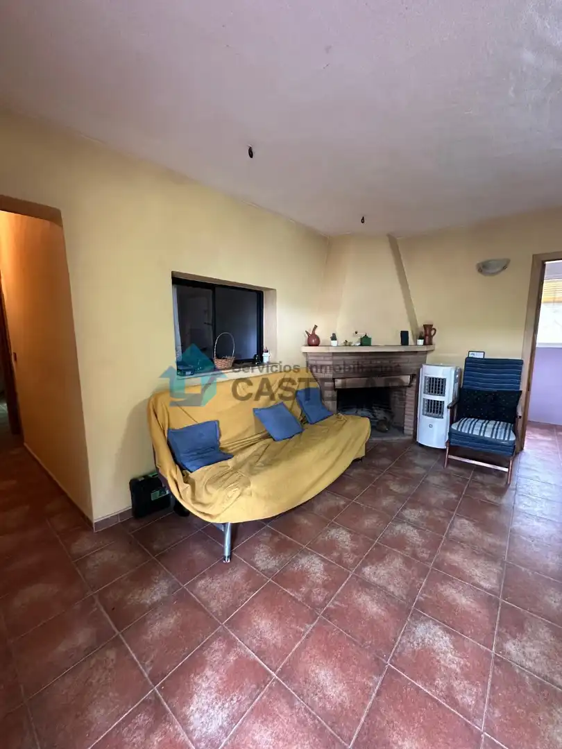 Sala d'estar de Casa o xalet en venda en Oliva de la Frontera amb Moblat