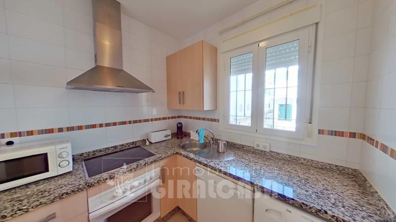 Kitchen of Duplex for sale in Mairena del Alcor  with Air Conditioner, Terrace and Storage room