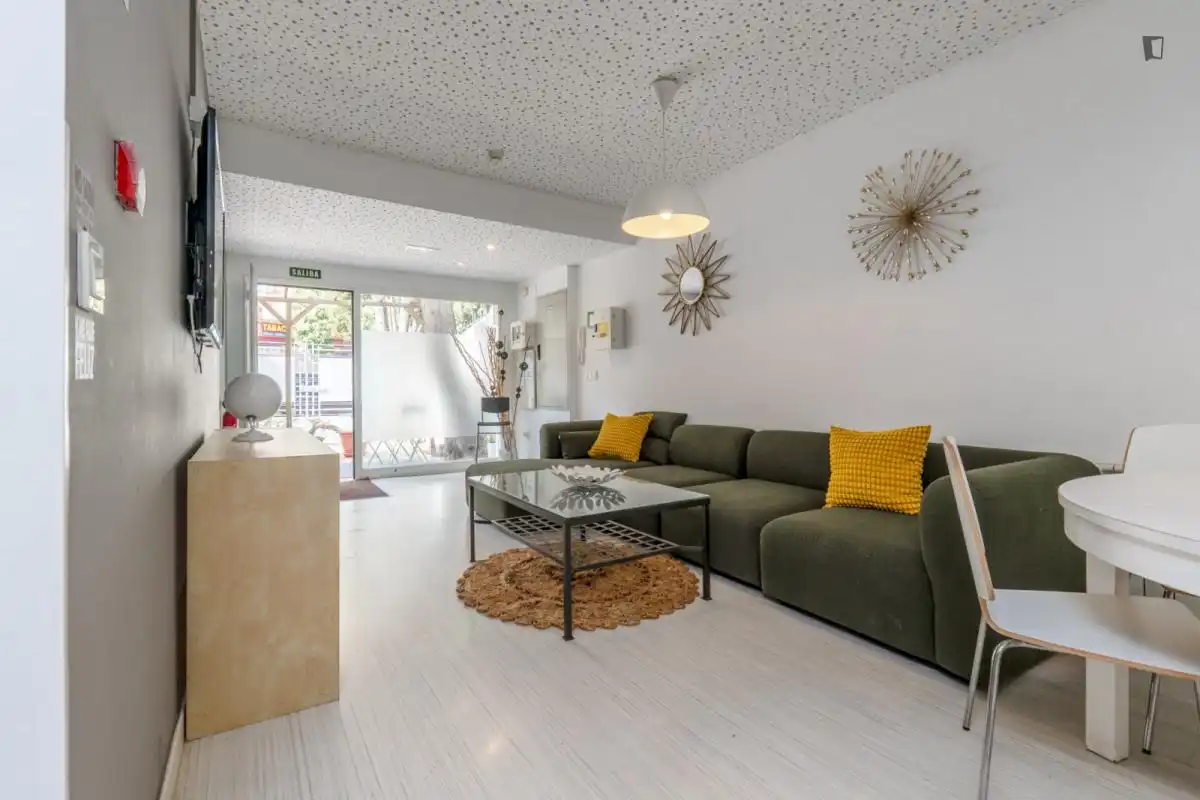 Sala d'estar de Casa o xalet per a compartir en Genil