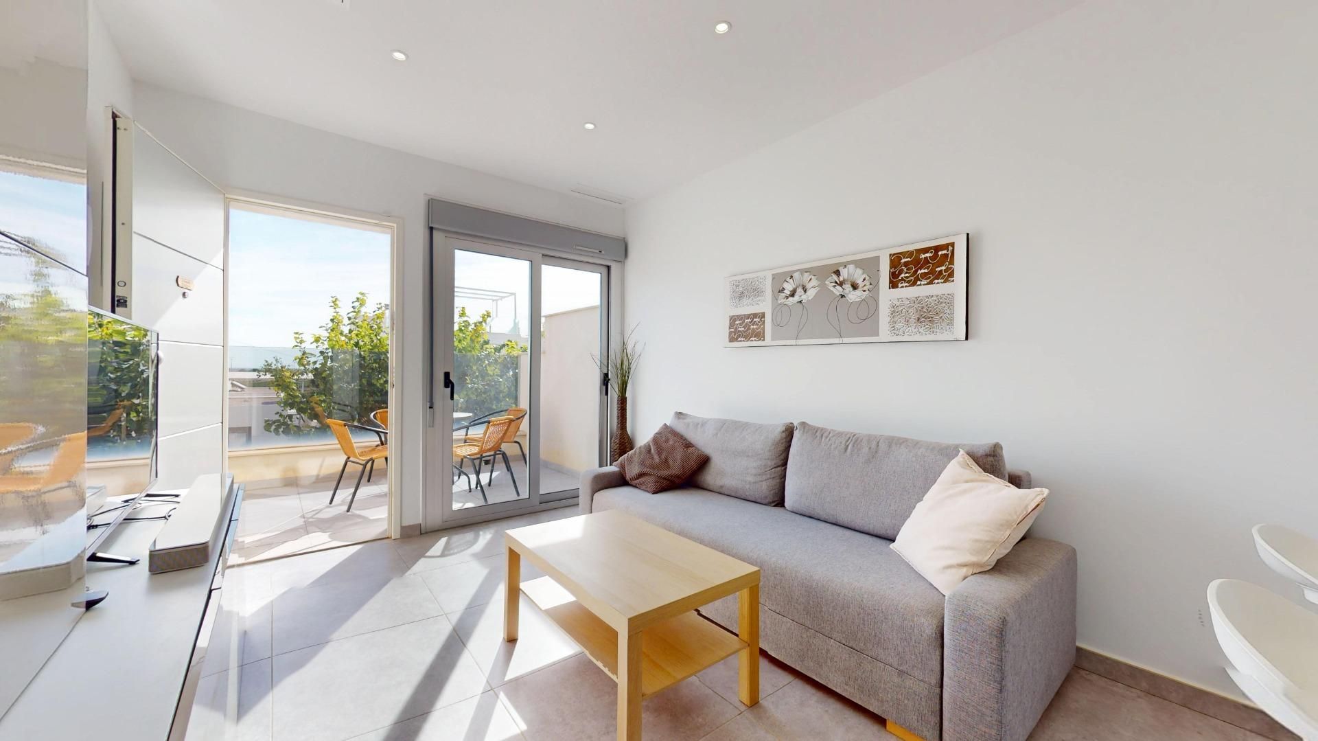 Wohnzimmer von Wohnungen zum verkauf in Pilar de la Horadada mit Privatgarten, Terrasse und Balkon