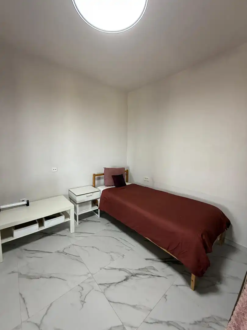 Dormitori de Apartament de lloguer en El Rosario amb Terrassa i Moblat