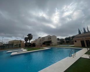 Piscina de Casa adosada en venda en Punta Umbría amb Jardí privat, Terrassa i Piscina