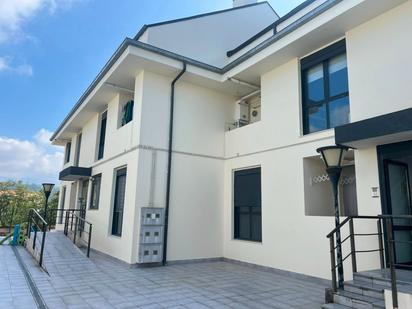 Exterior view of Duplex for sale in Reocín  with Heating, Parquet flooring and Storage room