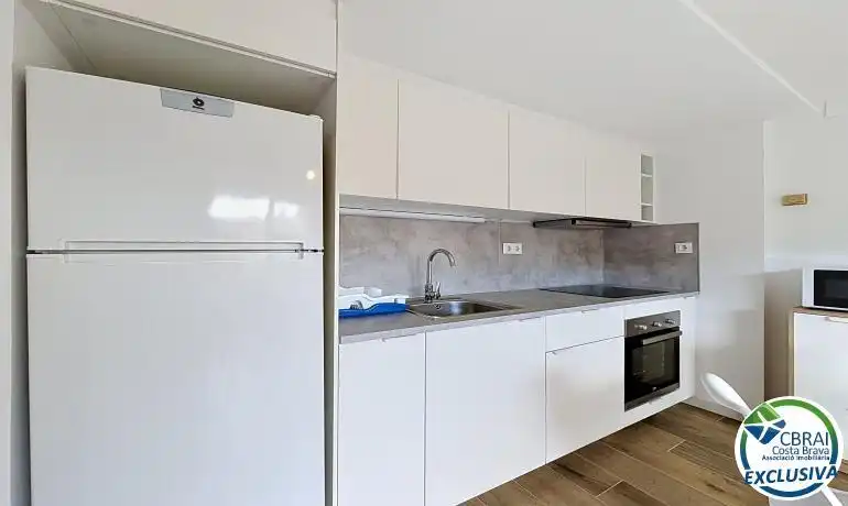 Kitchen of Flat for sale in Roses  with Heating, Terrace and Furnished