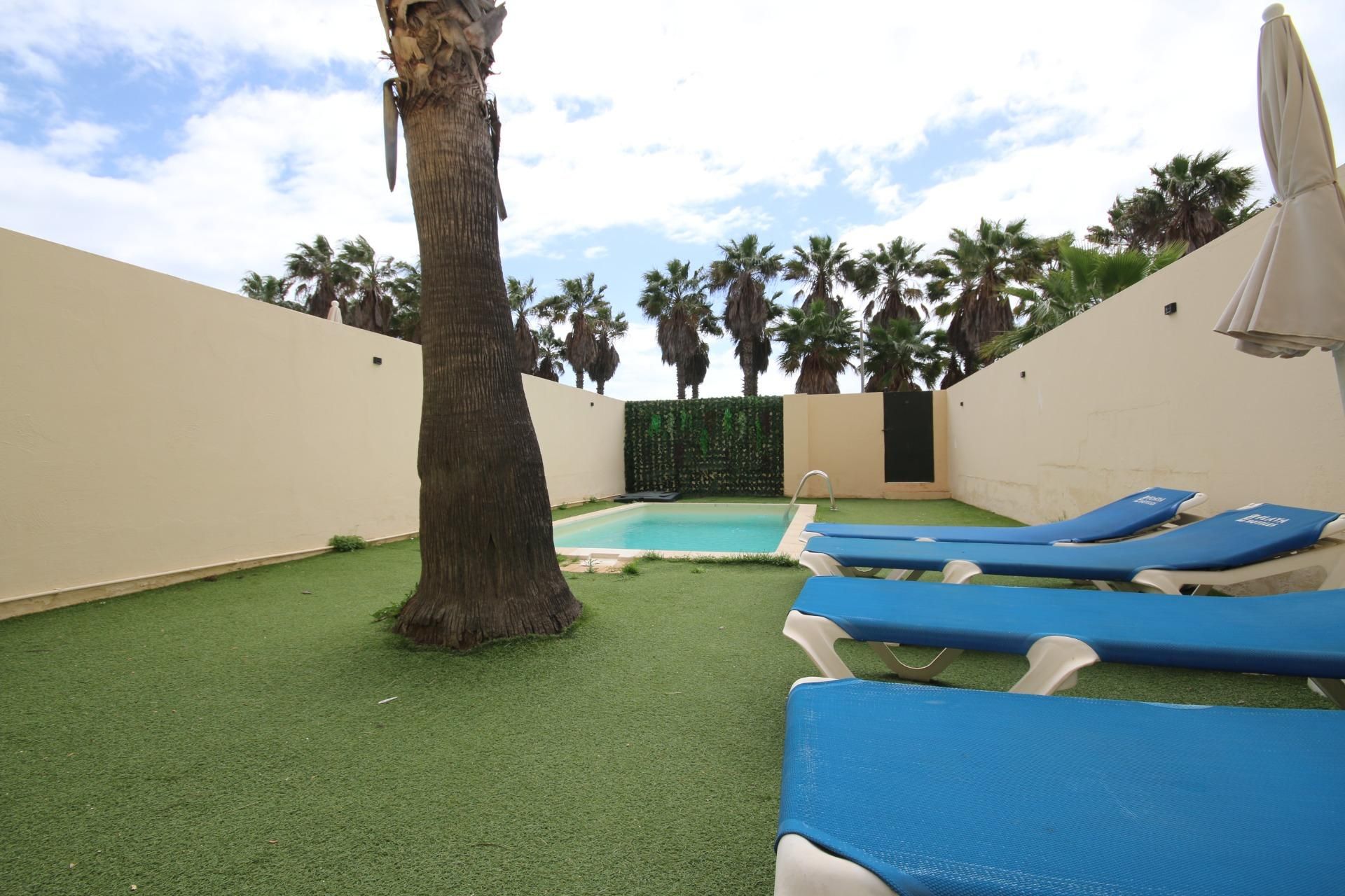 Swimming pool of Planta baja for sale in Ayamonte  with Air Conditioner, Heating and Private garden