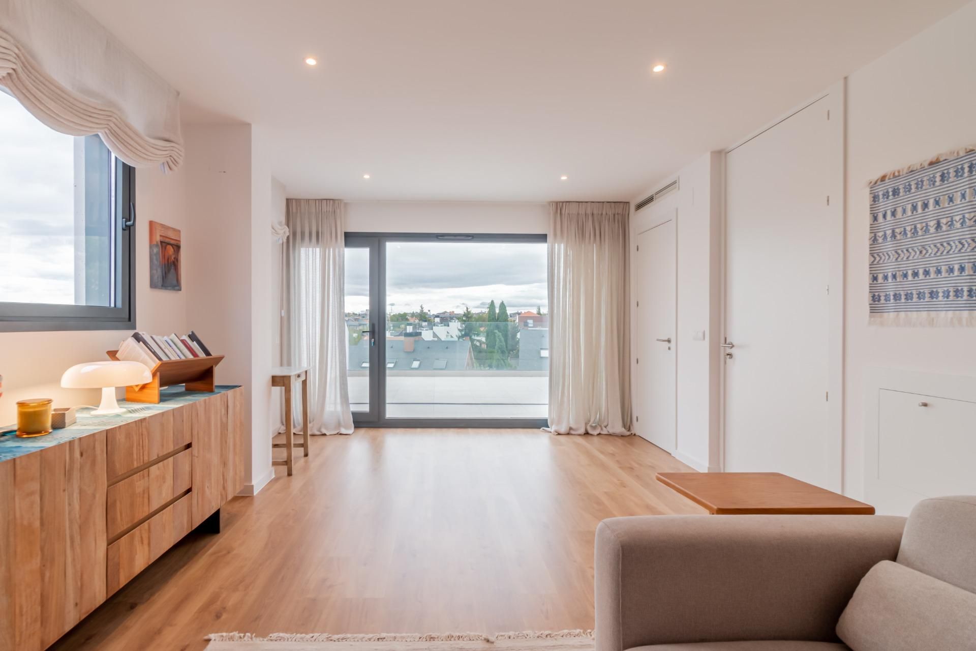 Sala de estar de Casa adosada en venta en Pozuelo de Alarcón