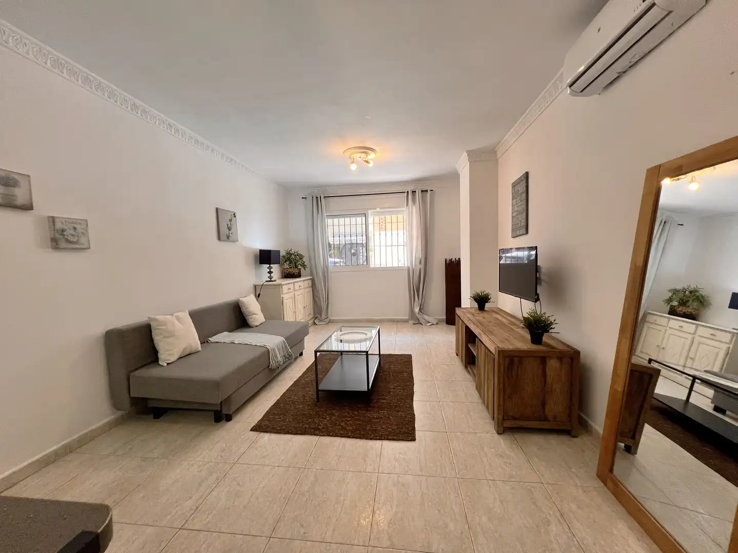 Sala d'estar de Apartament en venda en Mijas amb Aire condicionat i Piscina comunitària