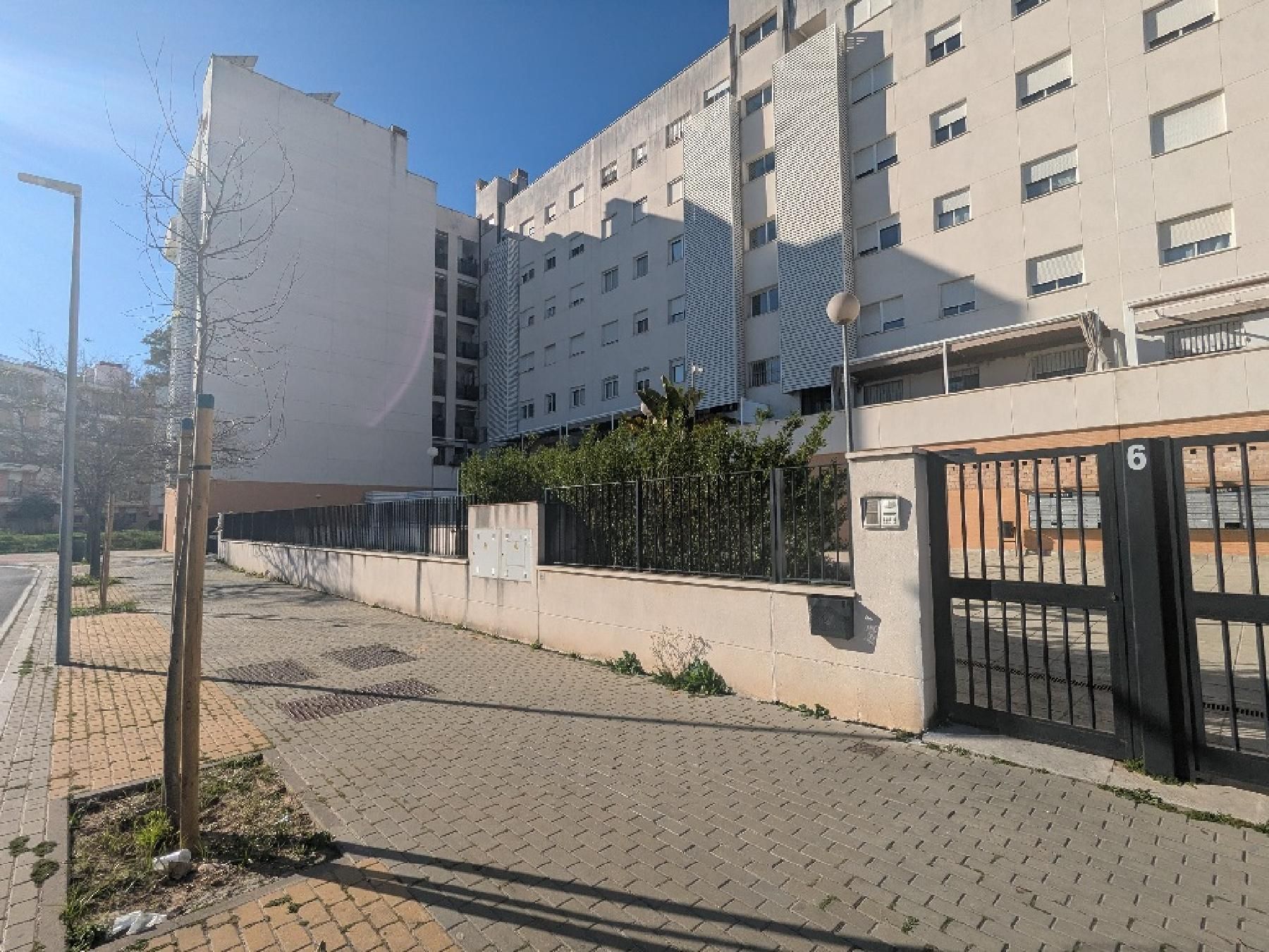 Exterior view of Garage for sale in  Sevilla Capital