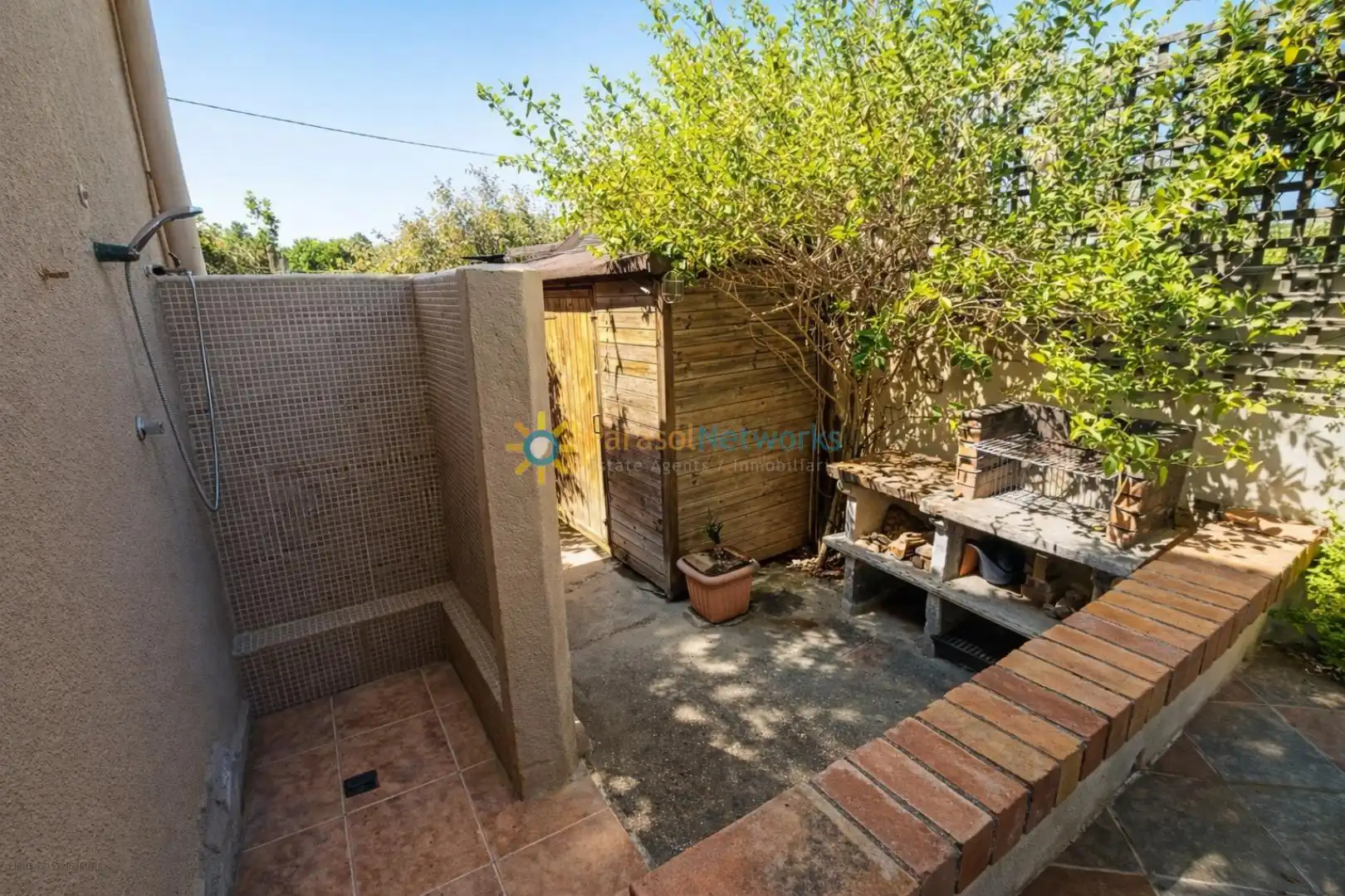 Terrassa de Casa o xalet en venda en Oliva amb Aire condicionat, Jardí privat i Terrassa