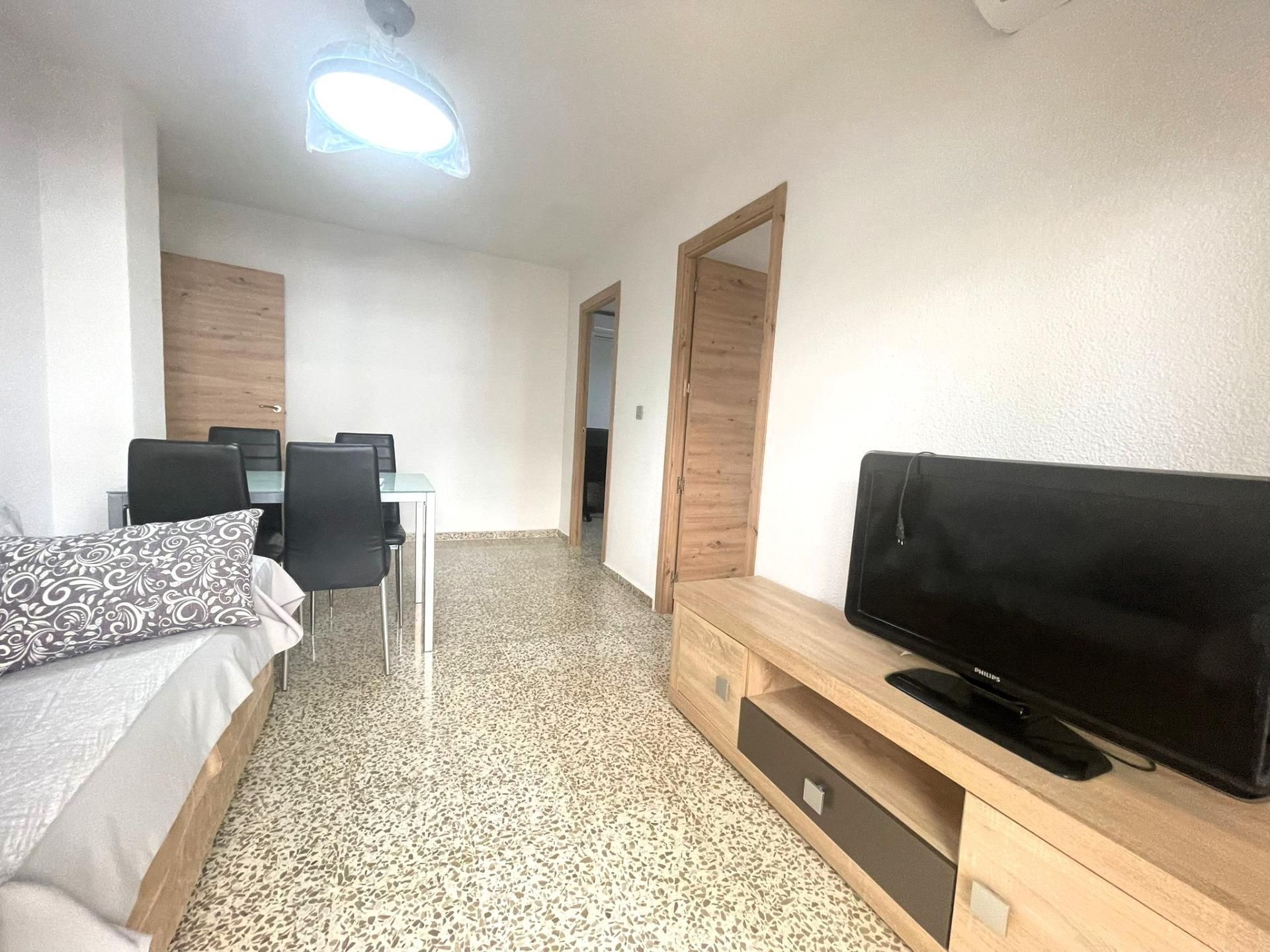 Living room of Flat to share in  Granada Capital  with Air Conditioner, Heating and Balcony