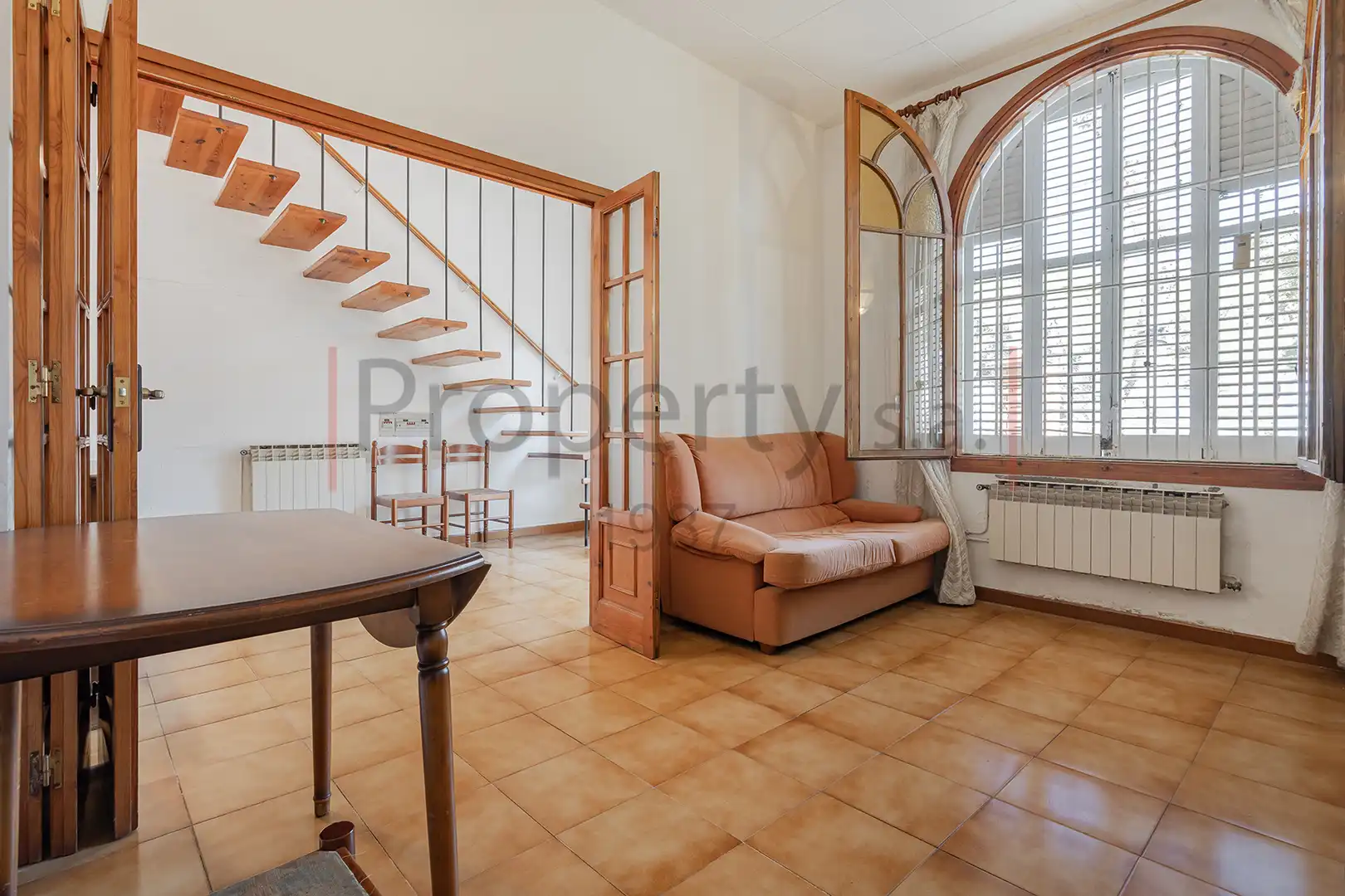 Sala d'estar de Casa adosada en venda en Esplugues de Llobregat amb Calefacció, Terrassa i Traster