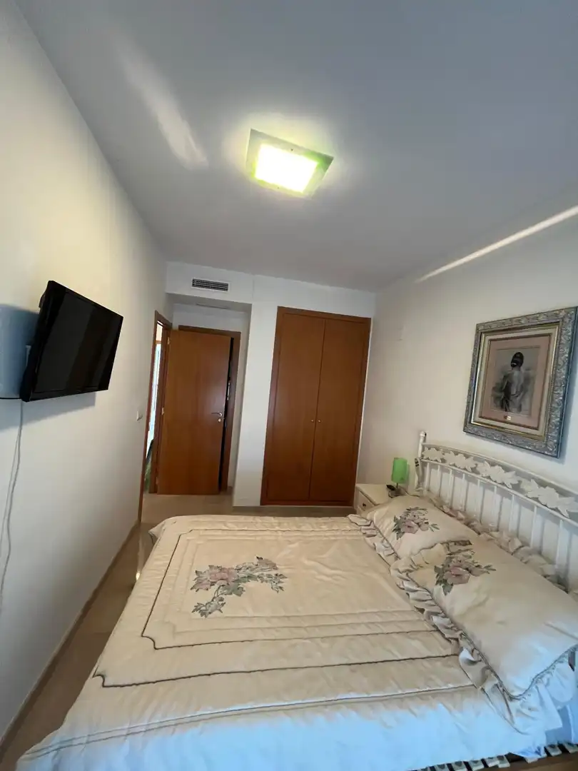 Habitación de Apartamento de alquiler en Gandia con Aire acondicionado, Calefacción y Jardín privado