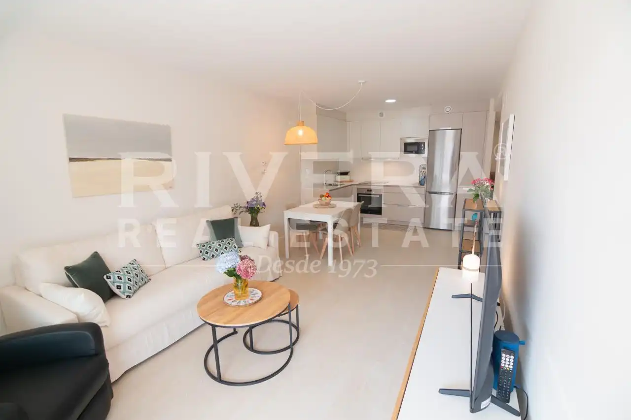 Sala de estar de Piso en venta en Sanxenxo con Calefacción, Terraza y Trastero