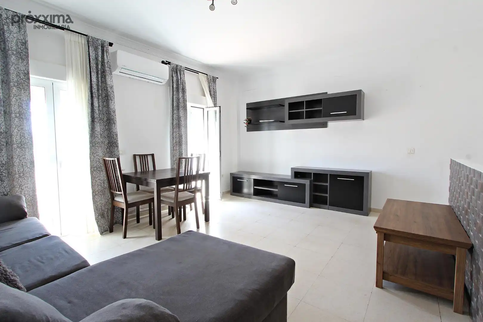 Sala de estar de Piso en venta en Sevilla con Aire acondicionado y Balcón