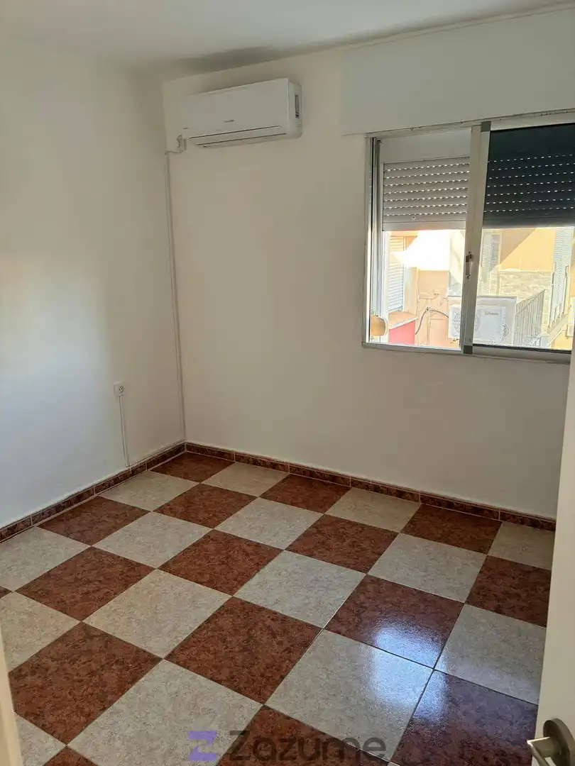 Schlafzimmer von Wohnung zur Miete in El Puerto de Santa María mit Klimaanlage, Heizung und Ofen