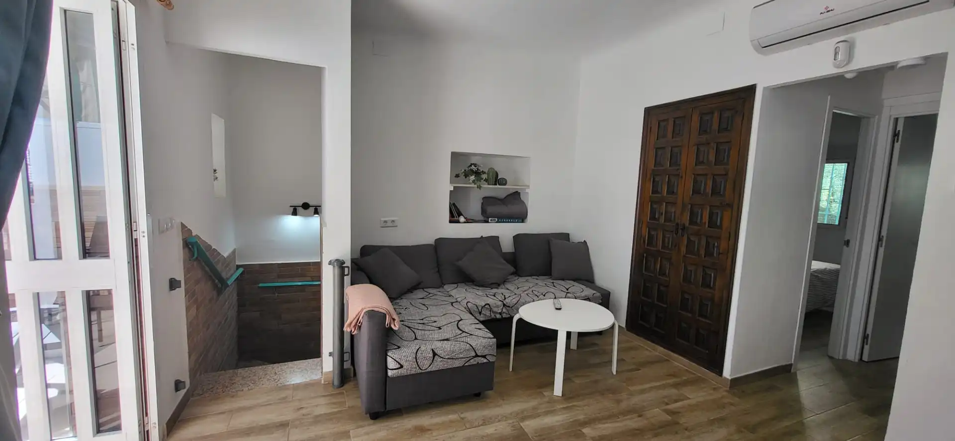 Sala d'estar de Casa adosada en venda en Vélez-Málaga amb Aire condicionat, Terrassa i Moblat