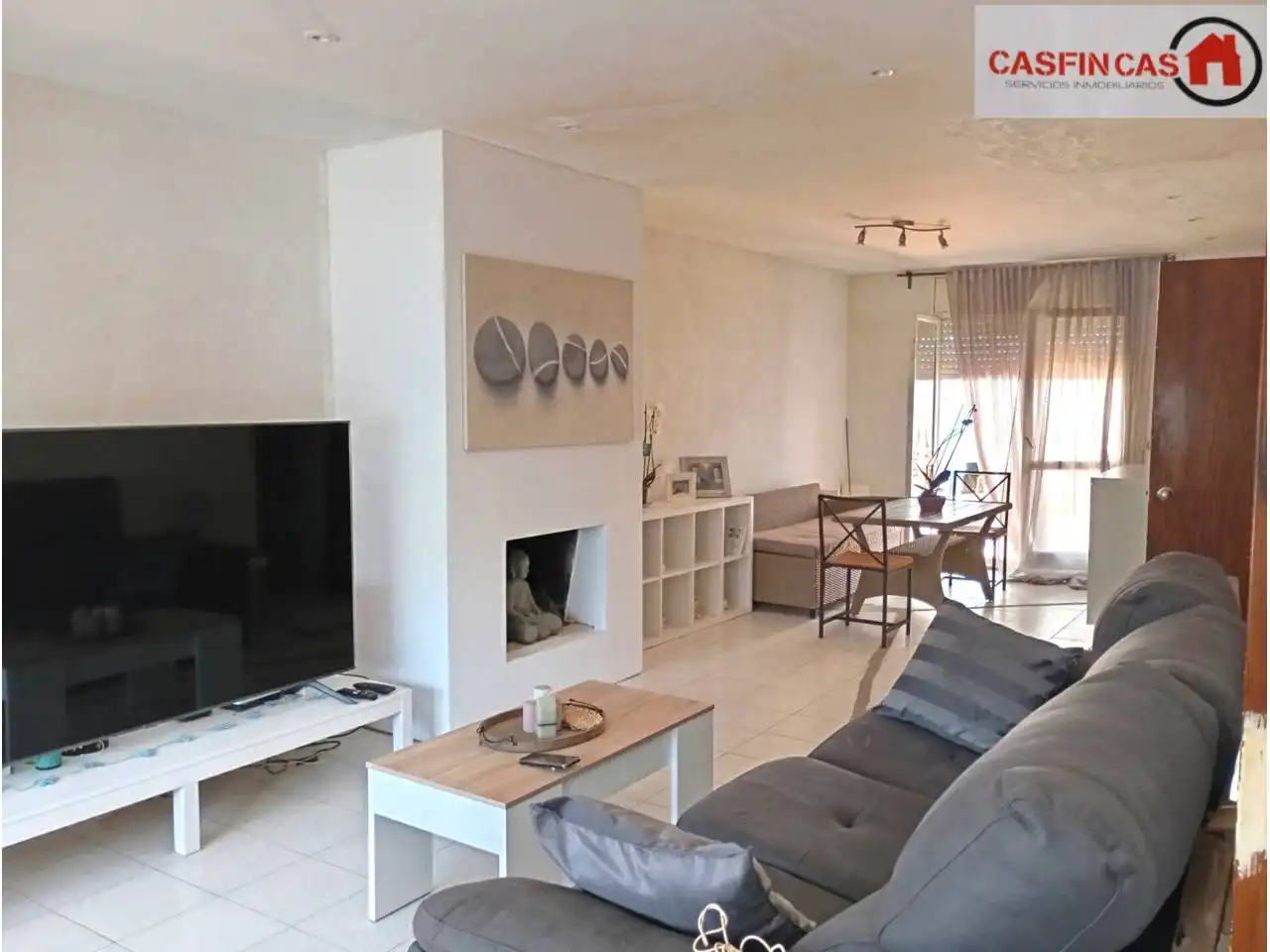 Sala d'estar de Casa o xalet en venda en Cunit amb Calefacció, Jardí privat i Terrassa