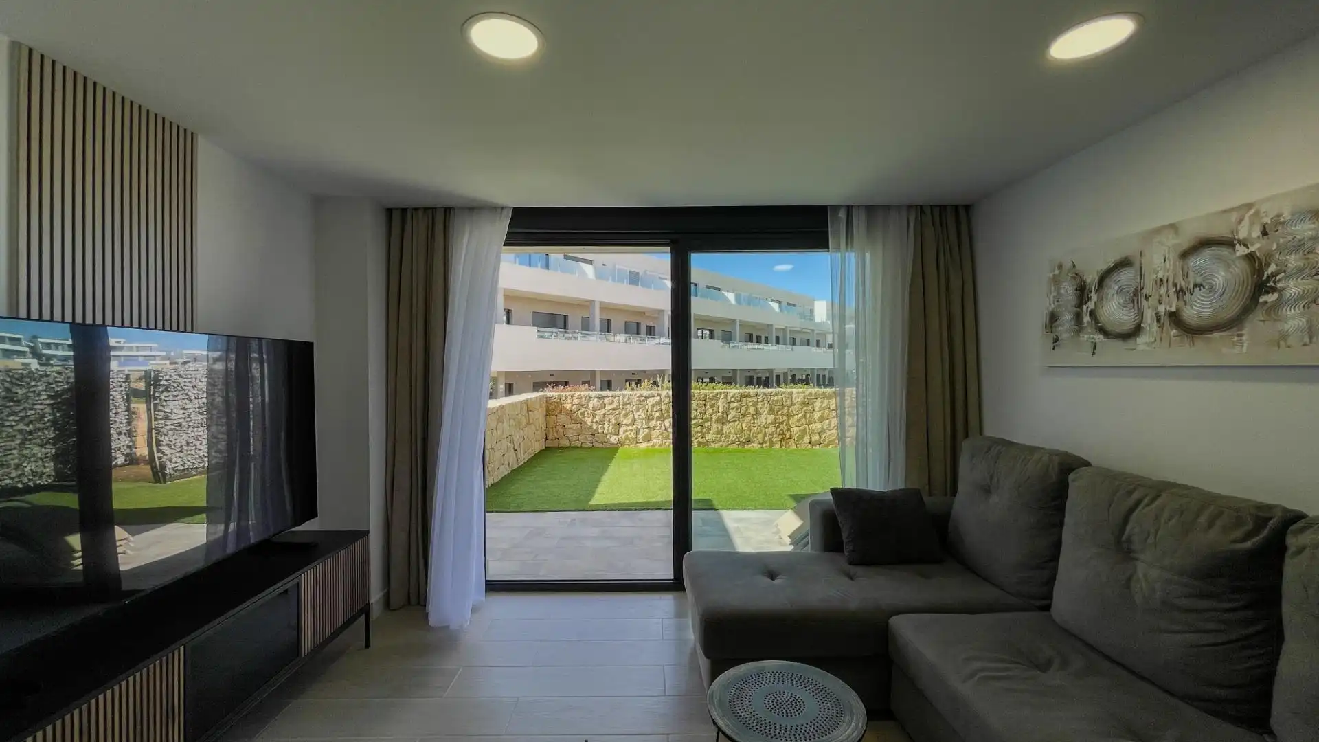 Sala de estar de Dúplex en venta en Finestrat con Aire acondicionado, Terraza y Amueblado