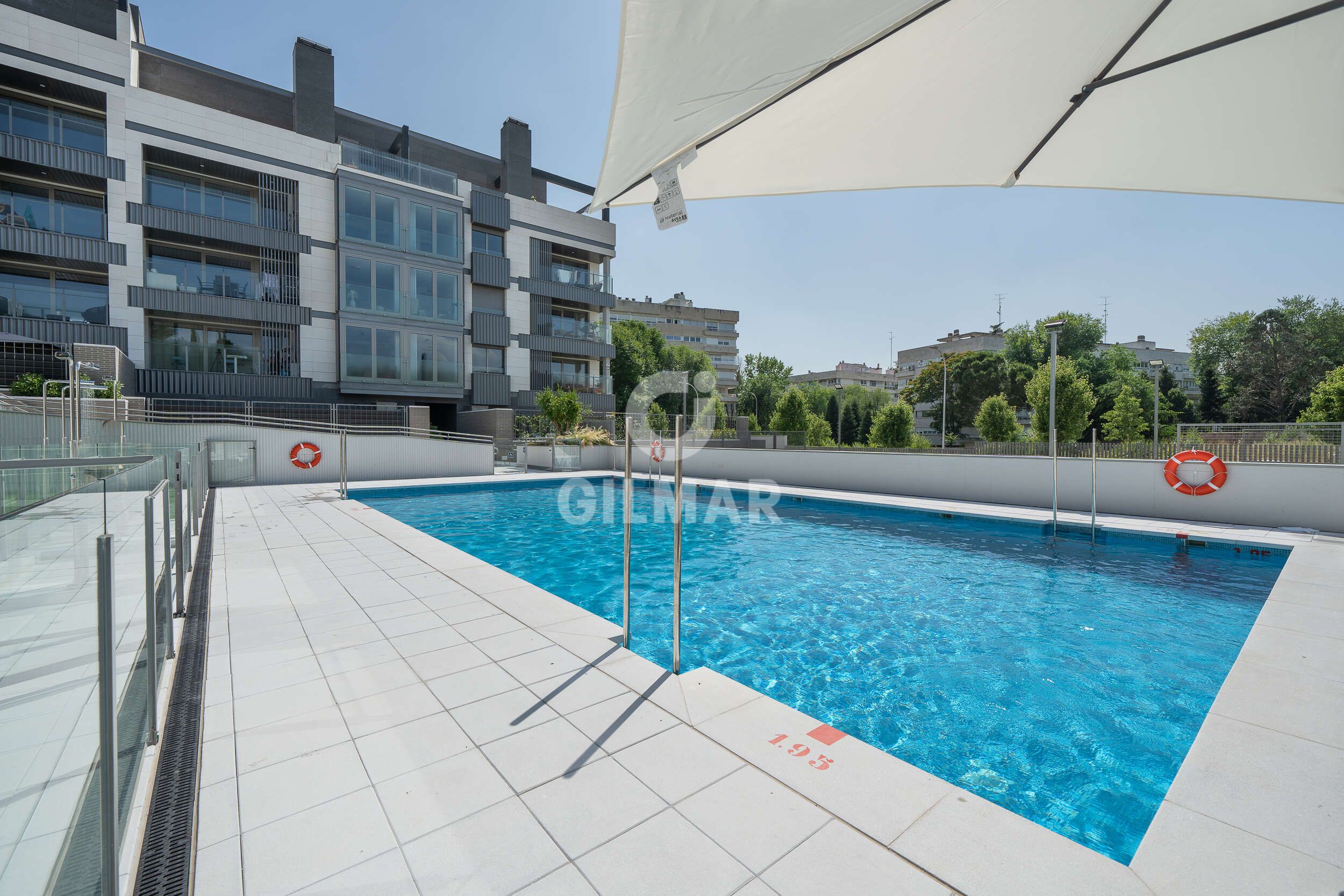 Swimming pool of Flat for sale in  Madrid Capital  with Heating, Private garden and Storage room
