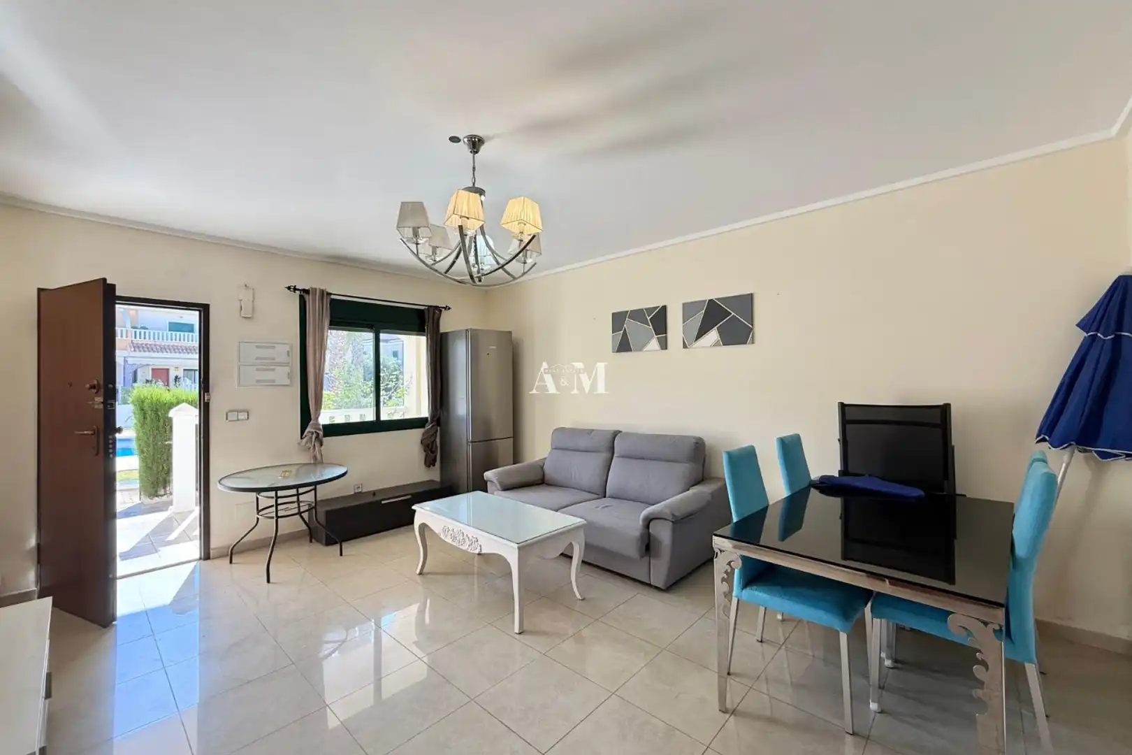 Sala de estar de Casa adosada de alquiler en Rojales con Aire acondicionado, Calefacción y Jardín privado